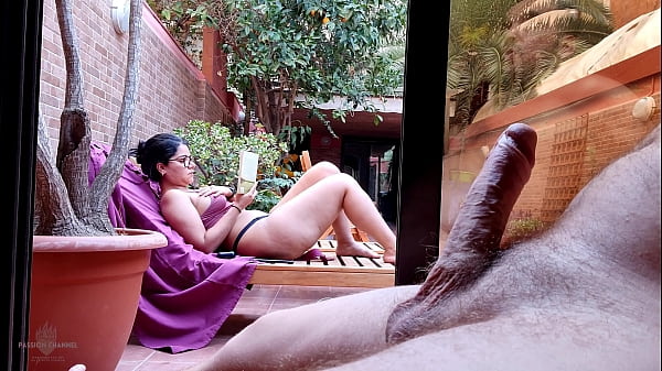My stepson takes out his big cock on the terrace, gets excited looking at me behind the window and showing his erection to the neighbors. My nipples are very hard and I&rsquo;m not wearing a bra.